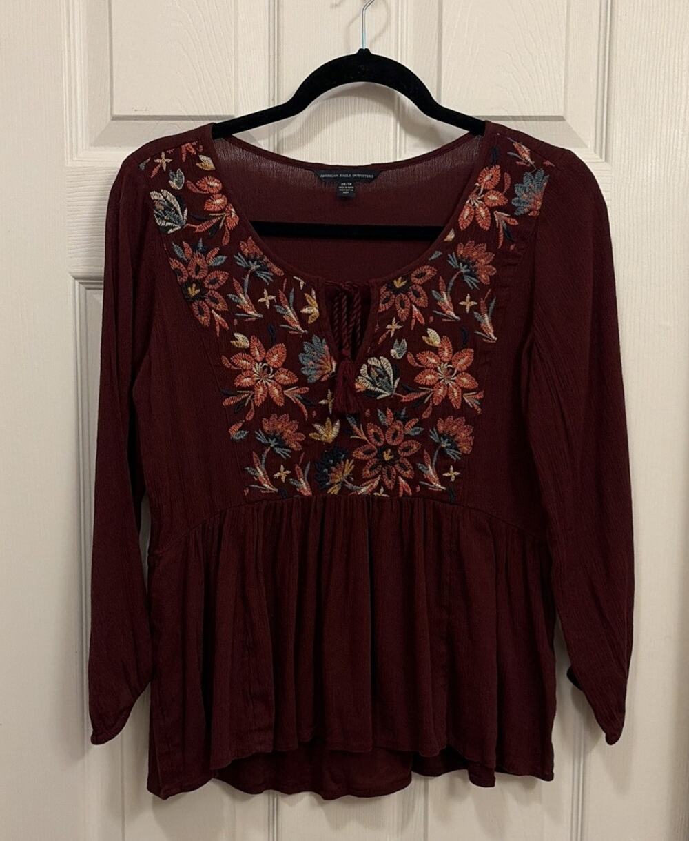 American Eagle XS Burgundy Peasant Blouse Floral Embroidery.